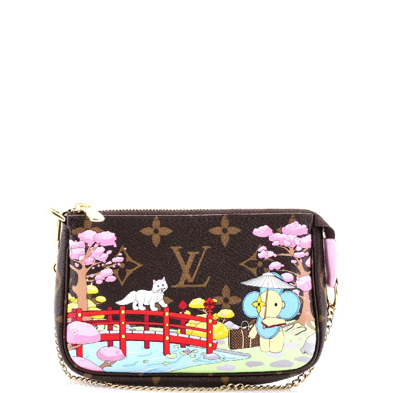 Pochette Accessoires Limited Edition Vivienne Xmas Monogram Canvas Mini